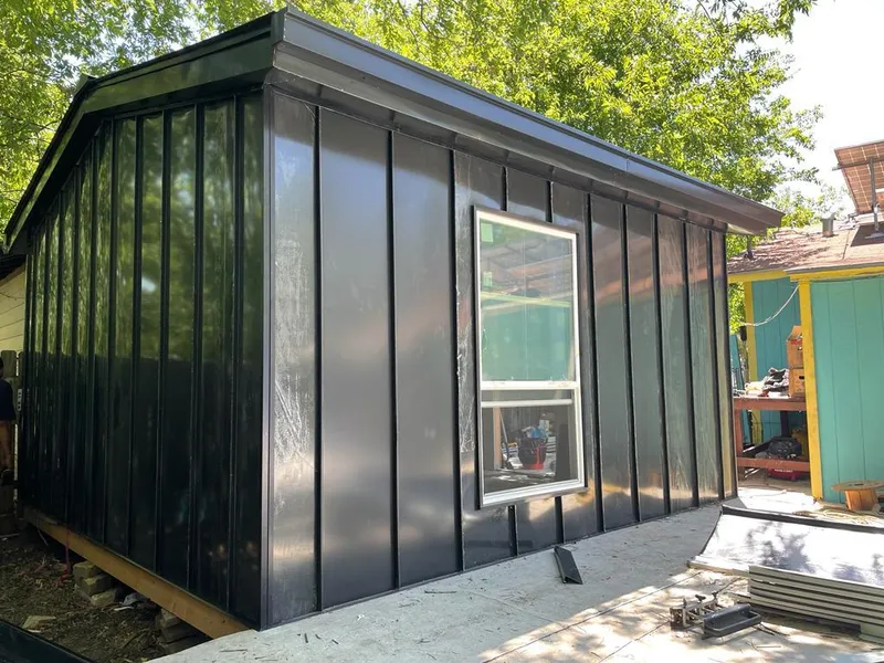 Black standing seam metal wall panels for Metal Roof Installation in Douglasville