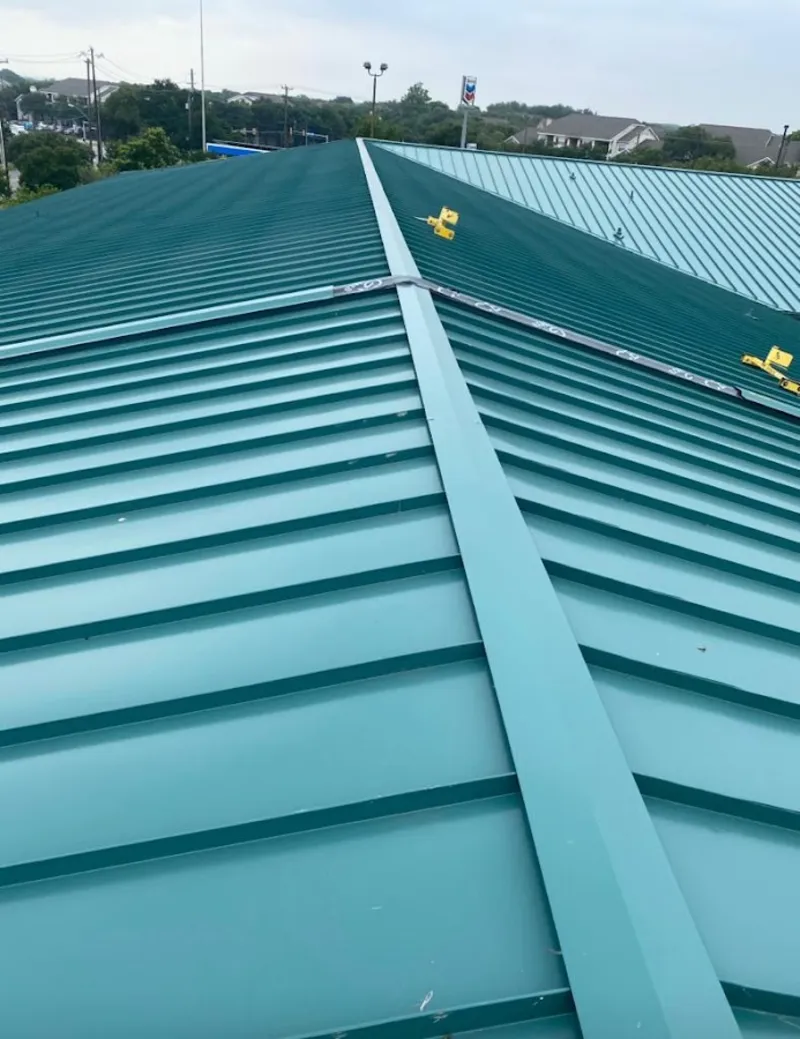 Green commercial metal roof ridge and valley for Metal Roof Repair in Douglasville