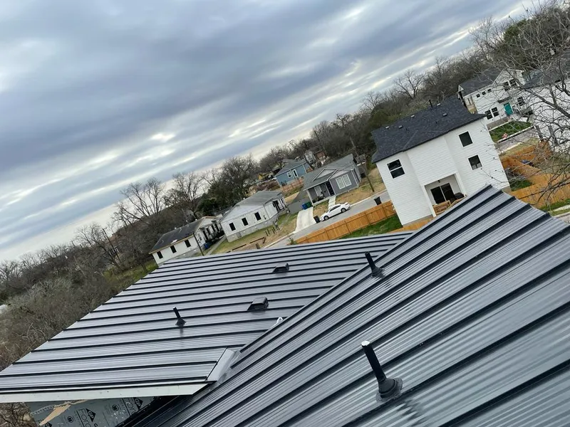 Standing seam metal roof panels with vents for Skylight Repair in Douglasville